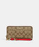 COACH®,LONG ZIP AROUND WALLET IN SIGNATURE CANVAS WITH STRAWBERRY,Mini,Im/Khaki/Electric Red,Front View