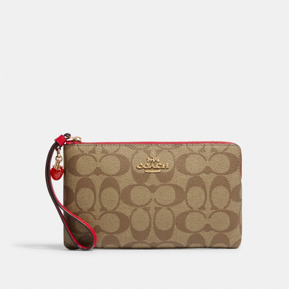 COACH® | Large Corner Zip Wristlet In Signature Canvas With Strawberry