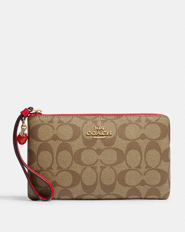 COACH® | Large Corner Zip Wristlet In Signature Canvas With Strawberry