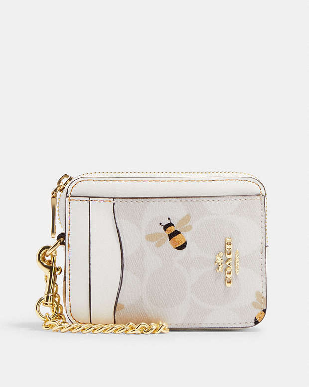 COACH® | Zip Card Case In Signature Canvas With Bee Print