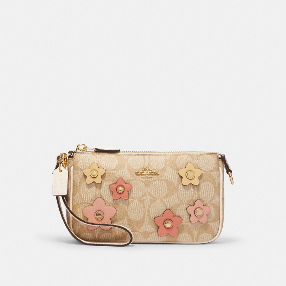 COACH®  Nolita 19 In Signature Canvas With Floral Applique