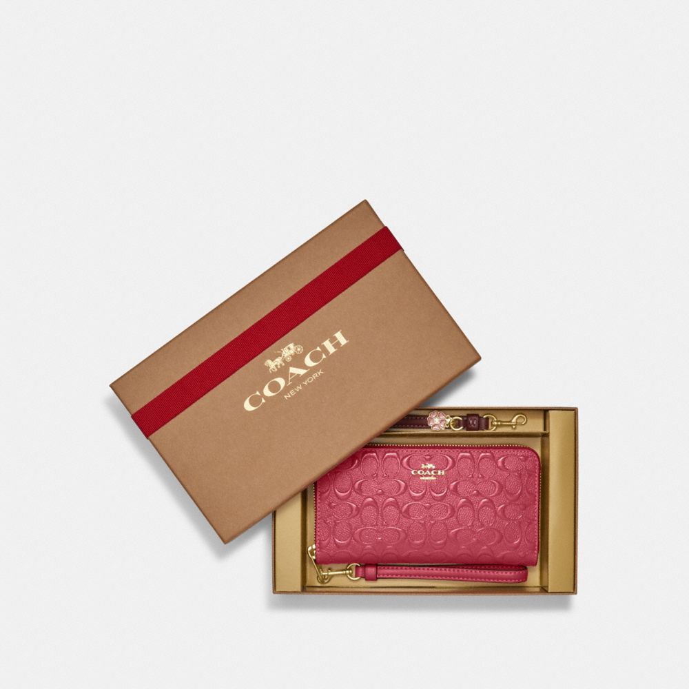 Coach Outlet COACH Long Zip Around Wallet In Signature Canvas