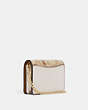 COACH®,MINI WALLET ON A CHAIN IN SIGNATURE CANVAS WITH FLORAL CLUSTER PRINT,Mini,Gold/Light Khaki Multi,Angle View