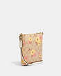 COACH®,MINI ROWAN FILE BAG IN SIGNATURE CANVAS WITH FLORAL CLUSTER PRINT,Small,Gold/Light Khaki Multi,Angle View