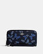 COACH®,LONG ZIP AROUND WALLET WITH LOVELY BUTTERFLY PRINT,Mini,Silver/Midnight Navy Multi,Front View