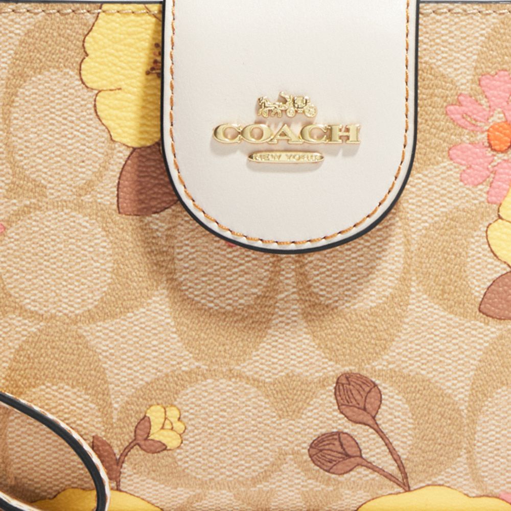 Coach Outlet Phone Wallet In Signature Canvas With Country Floral