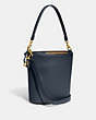 COACH®,DAKOTA BUCKET BAG,Glovetanned Leather,Large,Brass/Denim,Angle View