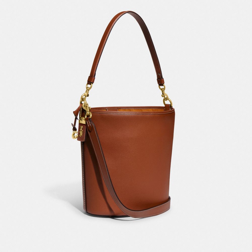 COACH®,DAKOTA BUCKET BAG,Glovetan Leather,Large,Brass/1941 Saddle,Angle View