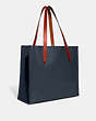 COACH®,RELAY TOTE,Polished Pebble Leather,Denim,Angle View
