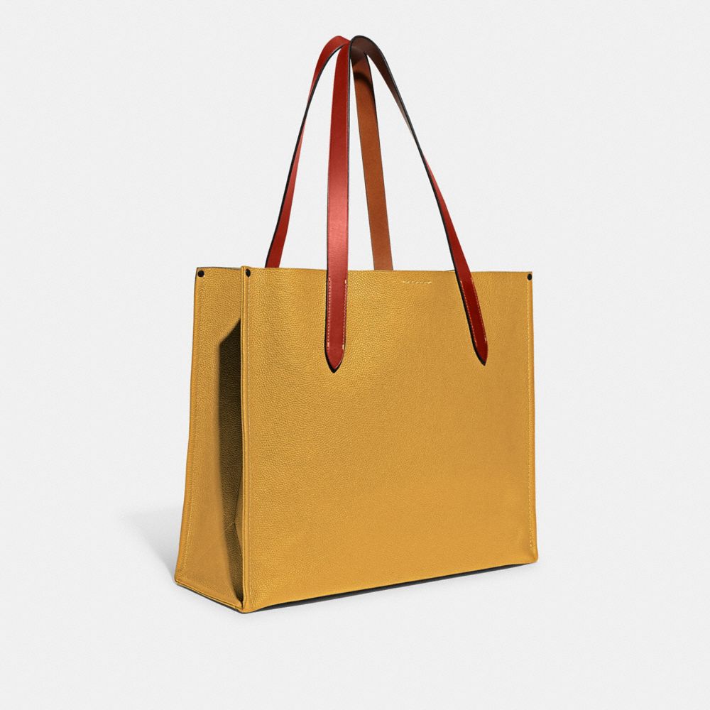 COACH®,RELAY TOTE BAG,Polished Pebble Leather,Large,Yellow Gold,Angle View