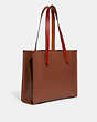 COACH®,RELAY TOTE 34,Polished Pebble Leather,Large,1941 Saddle,Angle View