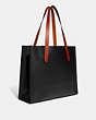 COACH®,RELAY TOTE WITH COACH GRAPHIC,Polished Pebble Leather,Large,Black,Angle View