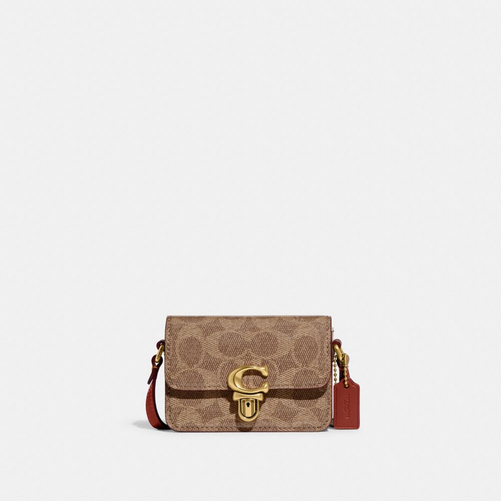 Coach signature online leather