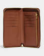 COACH®,MEDIUM ZIP AROUND WALLET,Refined Calf Leather,Small,Brass/1941 Saddle,Inside View,Top View