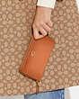 COACH®,MEDIUM ZIP AROUND WALLET,Refined Calf Leather,Mini,Brass/1941 Saddle,Detail View