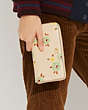 COACH®,ACCORDION ZIP WALLET WITH FLORAL PRINT,Refined Calf Leather,Floral,Brass/Ivory Multi,Detail View