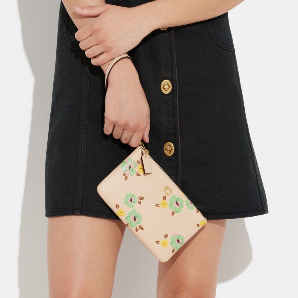 COACH®: Small Wristlet With Floral Bow Print