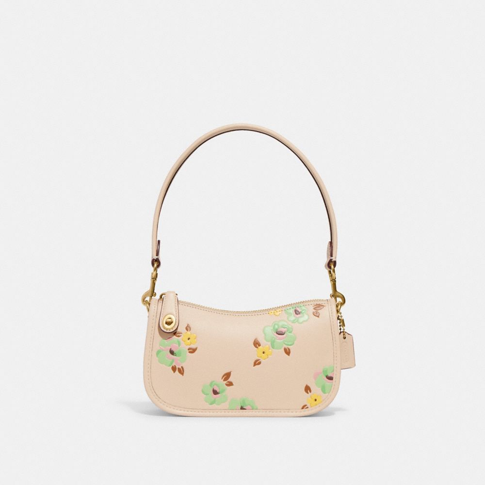 Coach floral print on sale handbags