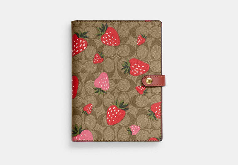COACH®,NOTEBOOK IN SIGNATURE CANVAS WITH WILD STRAWBERRY PRINT,Gold/Khaki Multi,Front View