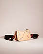 COACH®,UPCRAFTED SWINGER 20 IN ORIGINAL NATURAL LEATHER,Original Natural Leather,Mini,Brass/Buff,Angle View