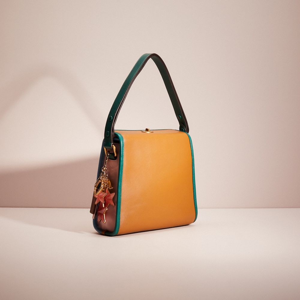 Coach turnlock shoulder bag in colorblock new arrivals