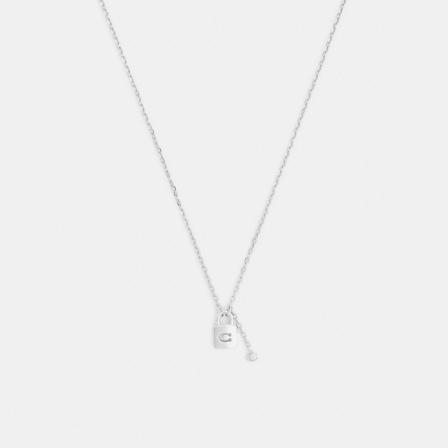 Женское колье Coach Signature Padlock Pendant, цвет: Серебряный — фото 1