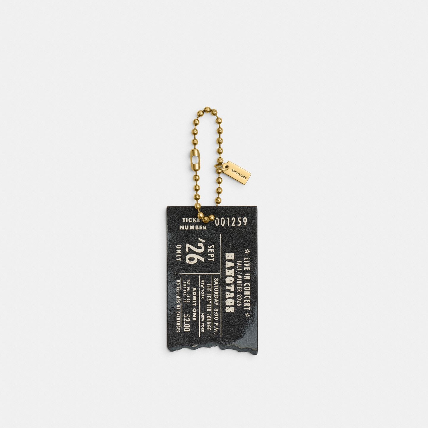 Женский брелок Coach Hangtags Concert Ticket Bag Charm, цвет: Латунный / Чёрный — фото 1