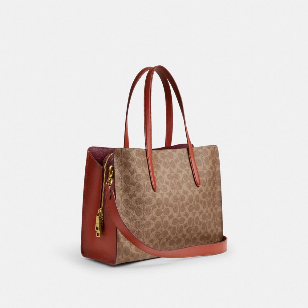 COACH®,CARTER CARRYALL BAG IN SIGNATURE CANVAS,Coated Canvas,Large,Brass/Tan/Rust,Angle View