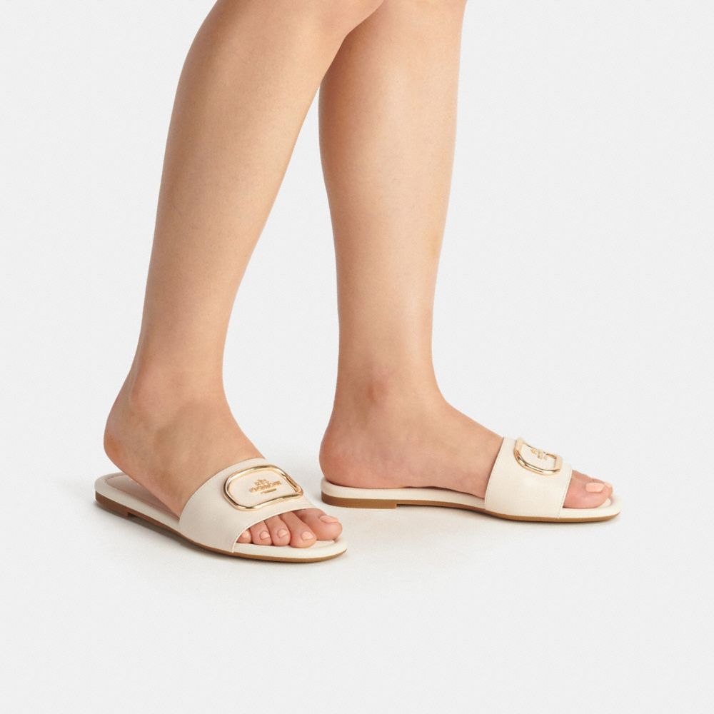 COACH®,Evy Sandal,Rubber,Leather,Lining Leather,Slides,Metal,Gold Metal,Casual,Cream,White,Detail View