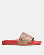 COACH®,ULI SPORT SLIDE IN SIGNATURE CANVAS WITH WILD STRAWBERRY PRINT,Electric Red,Angle View