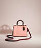 COACH®,RESTORED ROGUE 17 IN COLORBLOCK,Glovetanned Leather,Mini,Brass/Candy Pink Multi,Front View
