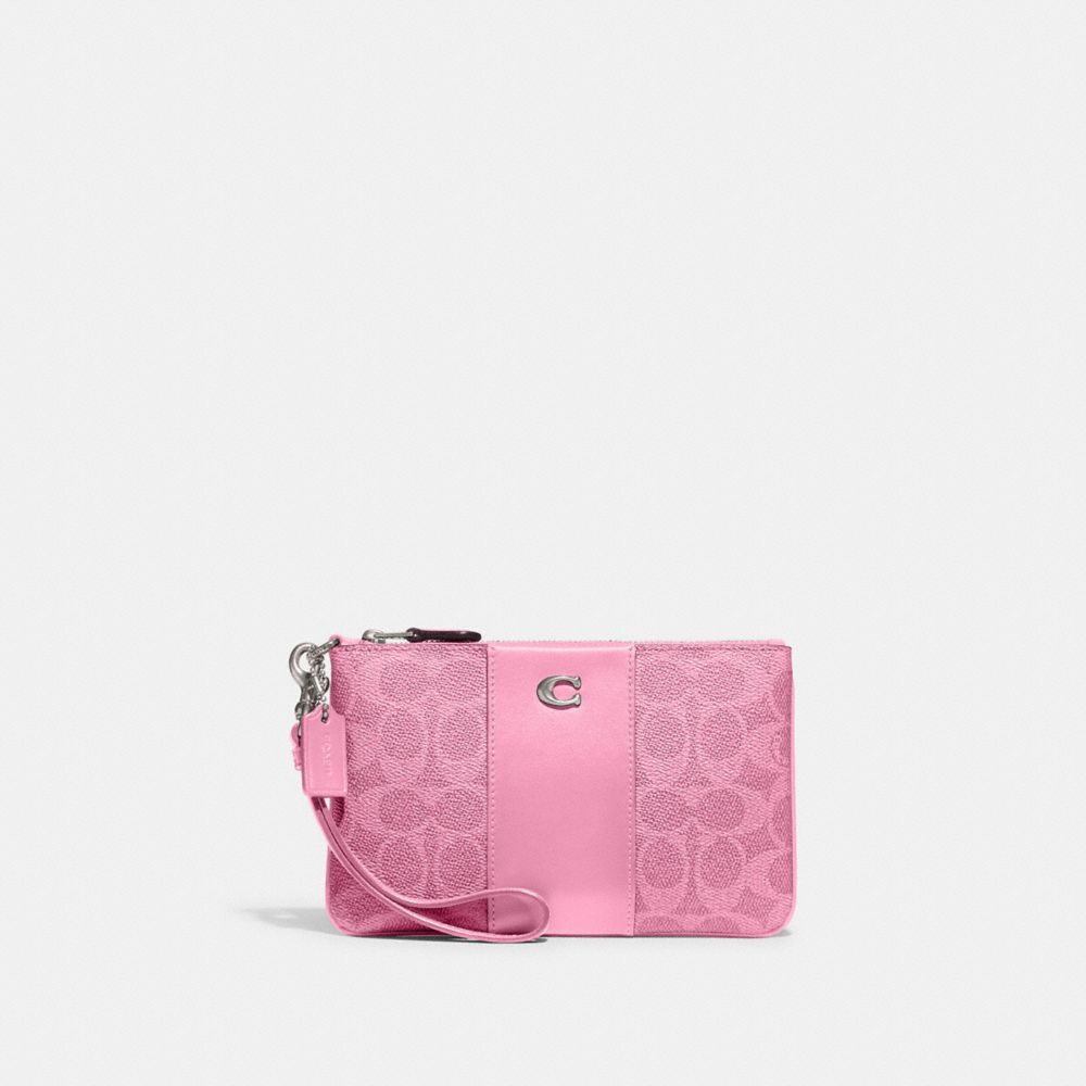 COACH®,SMALL WRISTLET IN SIGNATURE CANVAS,Coated Canvas,Mini,Silver/Vivid Pink,Front View