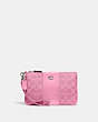 COACH®,SMALL WRISTLET IN SIGNATURE CANVAS,Coated Canvas,Mini,Silver/Vivid Pink,Front View