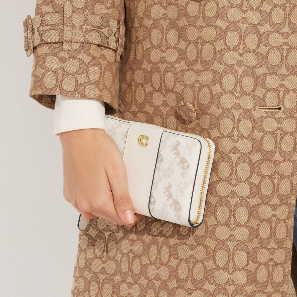 COACH®,アコーディオン ジップ ウォレット・ホース アンド キャリッジ プリント,長財布,ﾌﾞﾗｽ/ﾁｮｰｸ ﾄｰﾌﾟ