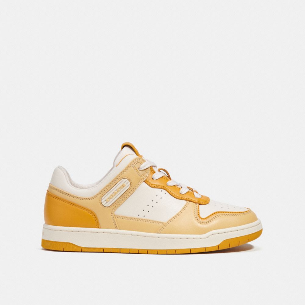COACH®,C201 Low Top Sneaker,Leather,Rubber,Activewear,Logo,Perforated,Traction,Tennis,,Angle View