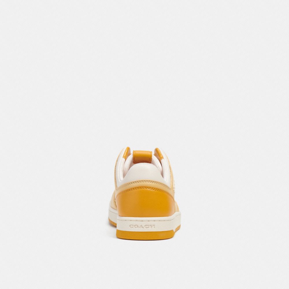 COACH®,C201 Low Top Sneaker,Leather,Rubber,Activewear,Logo,Perforated,Traction,Tennis,,Alternate View
