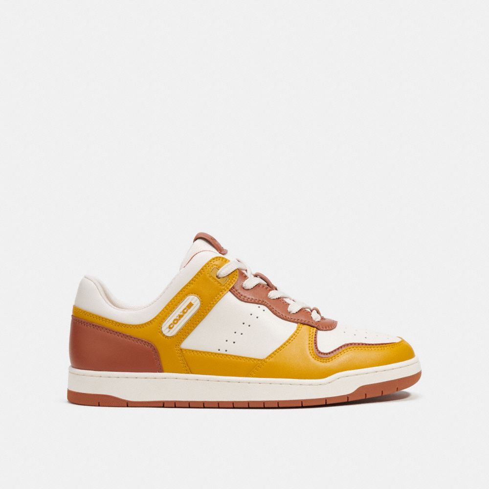 COACH®,C201 SNEAKER,Leather,Yellow Gold,Angle View