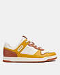 COACH®,C201 SNEAKER,Leather,Yellow Gold,Angle View