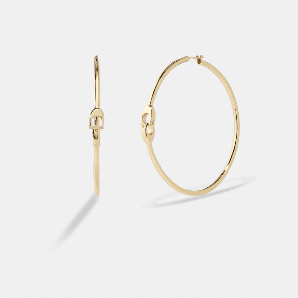 Coach gold deals hoop earrings