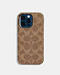 COACH®,IPHONE 14 PRO CASE IN SIGNATURE CANVAS,Signature Coated Canvas,Tan,Front View