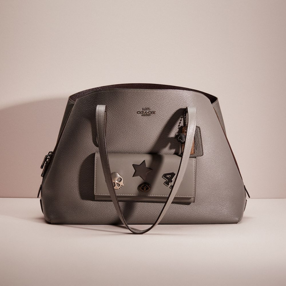 Coach charlie carryall on sale gunmetal