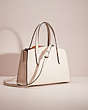 COACH®,UPCRAFTED CHARLIE CARRYALL 28,Polished Pebble Leather,Small,Gunmetal/Chalk,Angle View