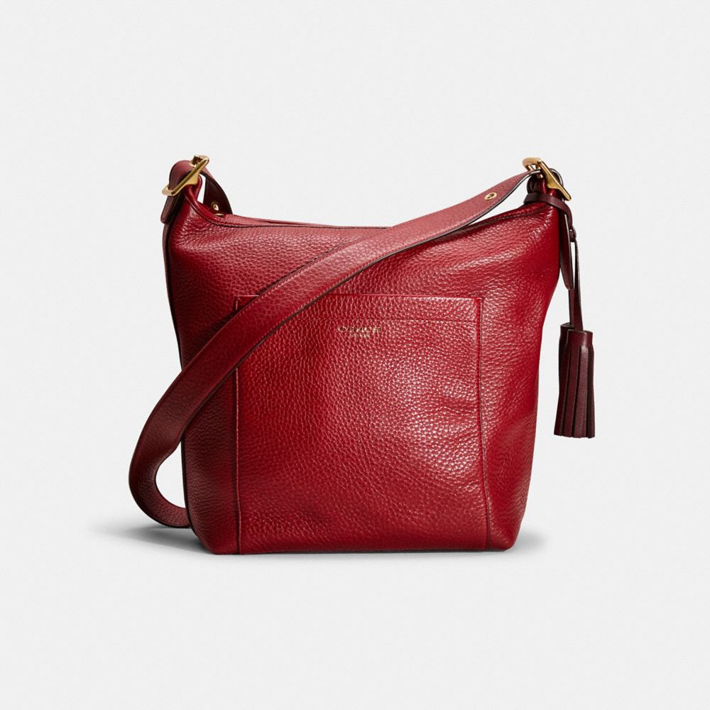 The inside is re-designed with red textile lining and legacy