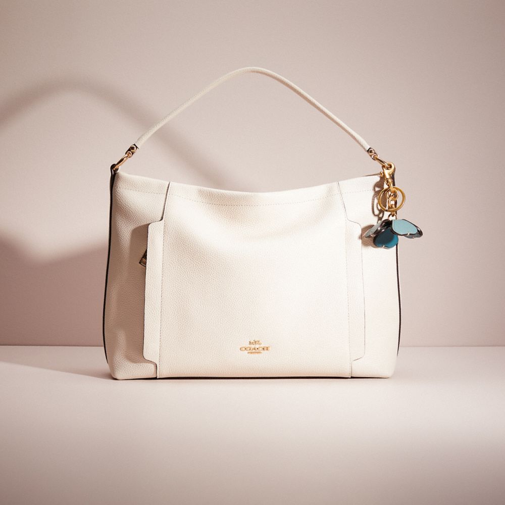 COACH®,Remade Tea Rose Bag Charm,,Angle View