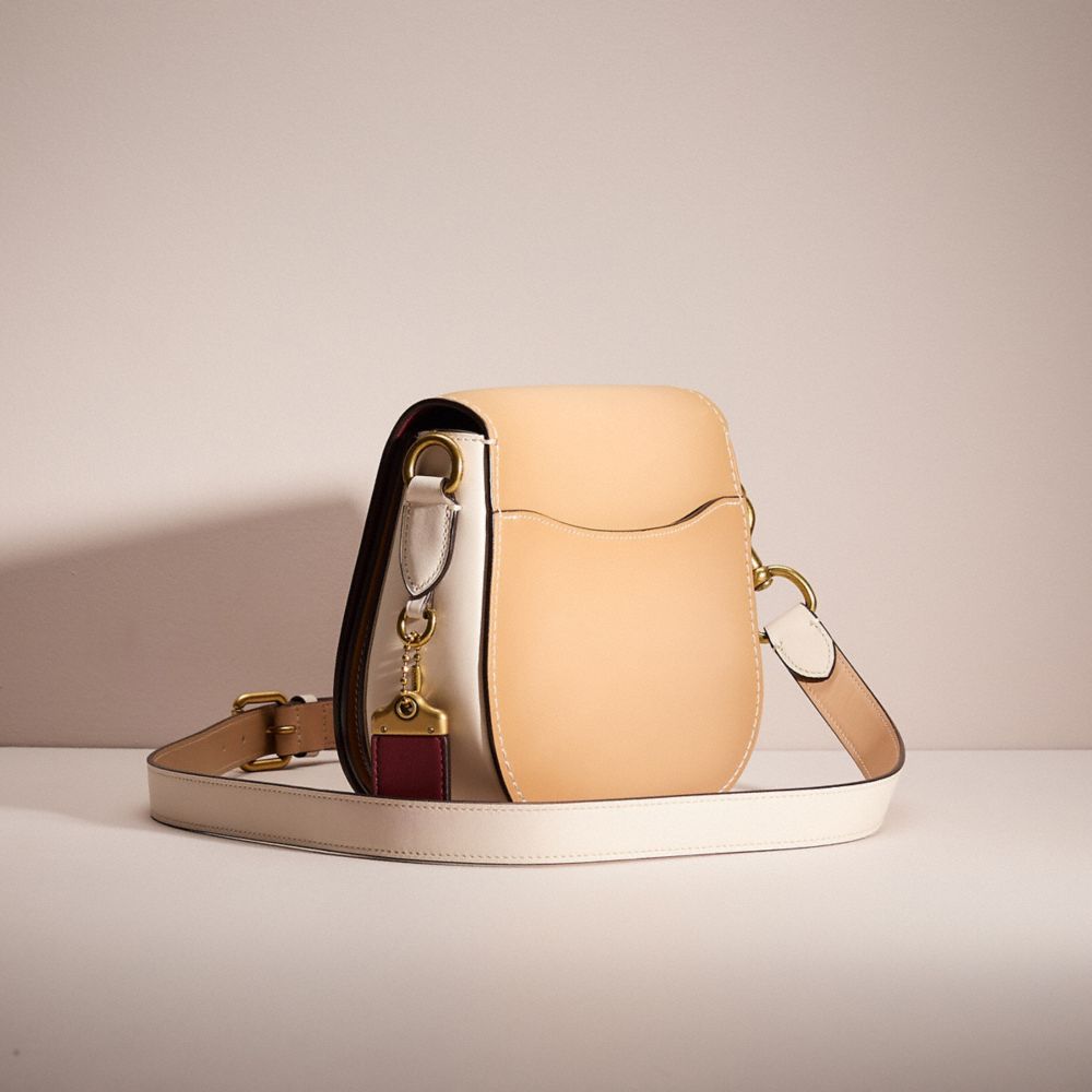 COACH®,RESTORED SADDLE IN COLORBLOCK,Polished Pebble Leather,Large,Brass/Beechwood Multi,Angle View