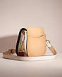 COACH®,RESTORED SADDLE IN COLORBLOCK,Polished Pebble Leather,Large,Brass/Beechwood Multi,Angle View