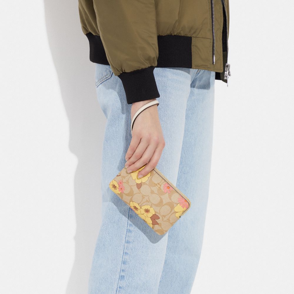COACH®,Corner Zip Wristlet In Signature Canvas With Floral Cluster Print,,Detail View