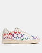COACH®,CLIP LOW TOP SNEAKER IN RAINBOW SIGNATURE CANVAS,pvc,White,Angle View