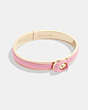 COACH®,TABBY ENAMEL HINGED BANGLE,enamel,Gold/Pink,Front View
