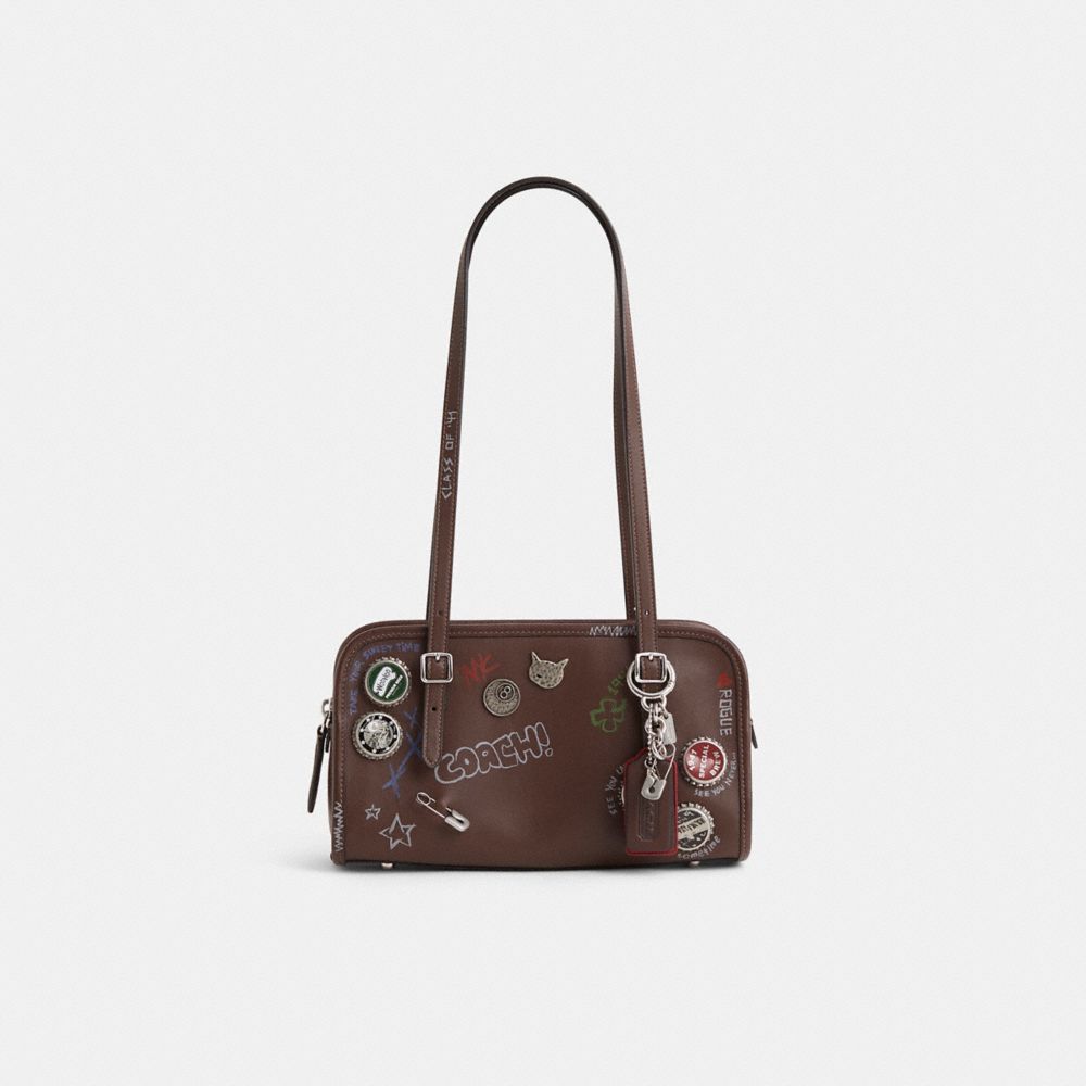 COACH®,Custom Swing Zip Bag,Leather,Baguette,Metal Material,Word Embellishment,Graphic,Metal,Studded,Sustainable,Adjustable,G,Brown,Front View